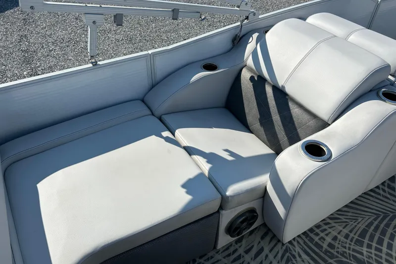 Slide: The Image of Luxurious seating on 2016 Crest Classic 250 SLR2 pontoon boat with cup holders. - 15