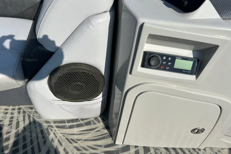 Slide: The Image of 2016 Crest Classic 250 SLR2 boat interior with speaker and control panel. - 18