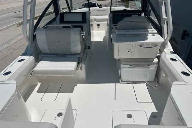 Slide: The Image of 2026 World Cat 265 DC-X boat interior with modern seating and sleek design. - 10