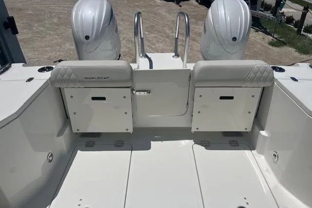 Slide: The Image of 2026 World Cat 265 DC-X boat deck with dual engines and seating. - 8