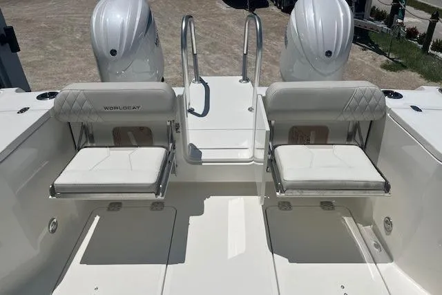 Slide: The Image of 2026 World Cat 265 DC-X boat with dual seats and twin engines. - 9