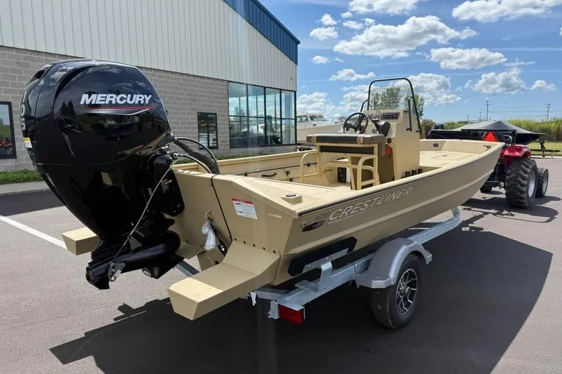 Slide: The Image of 2026 Crestliner 1870 Retriever FCC boat with Mercury engine on trailer, outdoors. - 4