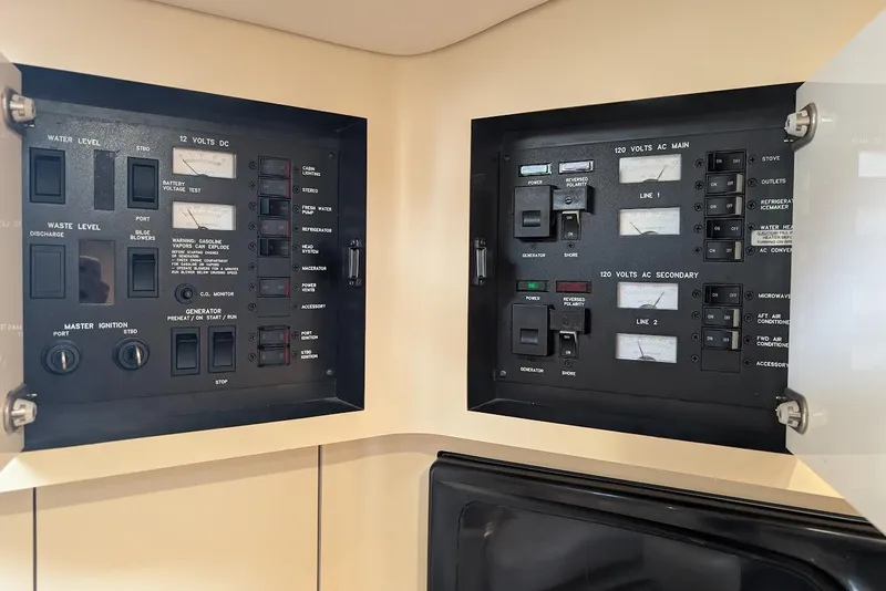 Slide: The Image of Electrical control panel on a 1998 Sea Ray 370 Sundancer boat. - 31