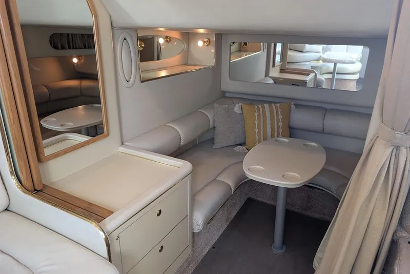 Slide: The Image of Luxurious interior of 1998 Sea Ray 370 Sundancer yacht with cozy seating and elegant decor. - 35
