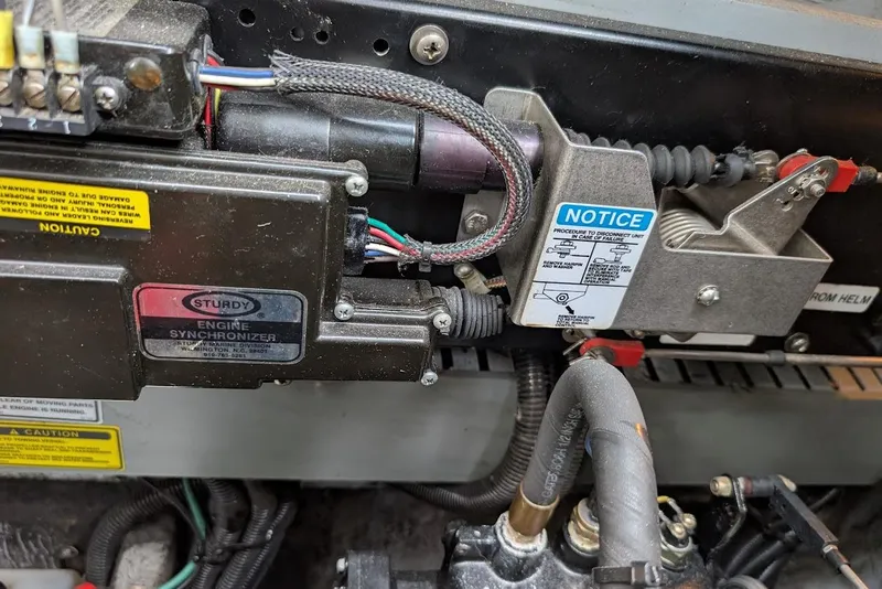 Slide: The Image of Engine synchronizer system in a 1998 Sea Ray 370 Sundancer boat. - 57