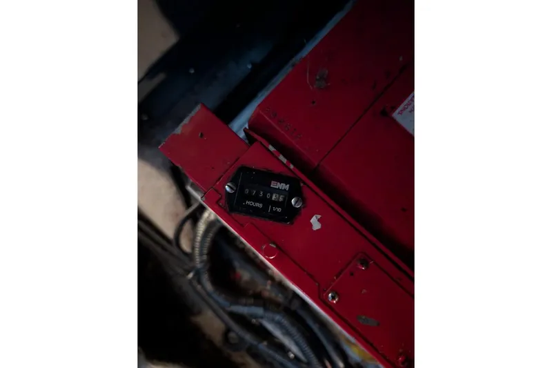 Slide: The Image of Hour meter on a 1998 Sea Ray 370 Sundancer boat engine compartment. - 58