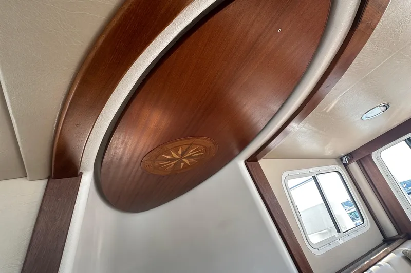 Slide: The Image of Raymarine device on 2006 American Tug 41, labeled "Ancient Mariners II" with call sign WND 3119. - 17