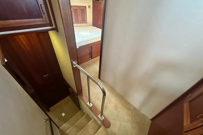 Slide: The Image of Electrical panel on a 2006 American Tug 41 boat, featuring various switches and controls. - 19