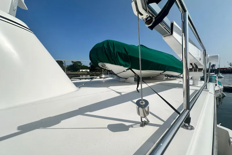 Slide: The Image of Overhead view of a 2006 American Tug 41 boat's bow with anchor and winch. - 43