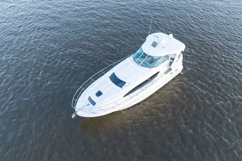 Slide: The Image of 2007 Sea Ray 40 Motor Yacht on open water, aerial view. - 10