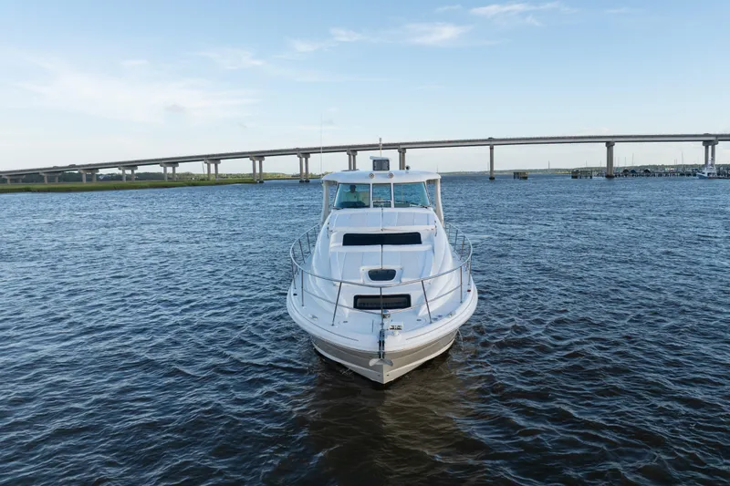 Slide: The Image of 2007 Sea Ray 40 Motor Yacht on water with bridge in background. - 19
