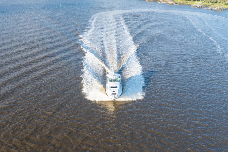 Slide: The Image of 2007 Sea Ray 40 Motor Yacht cruising on open water, aerial view. - 26