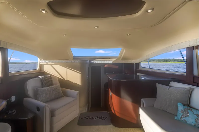Slide: The Image of Luxurious interior of 2007 Sea Ray 40 Motor Yacht with plush seating and scenic water views. - 31