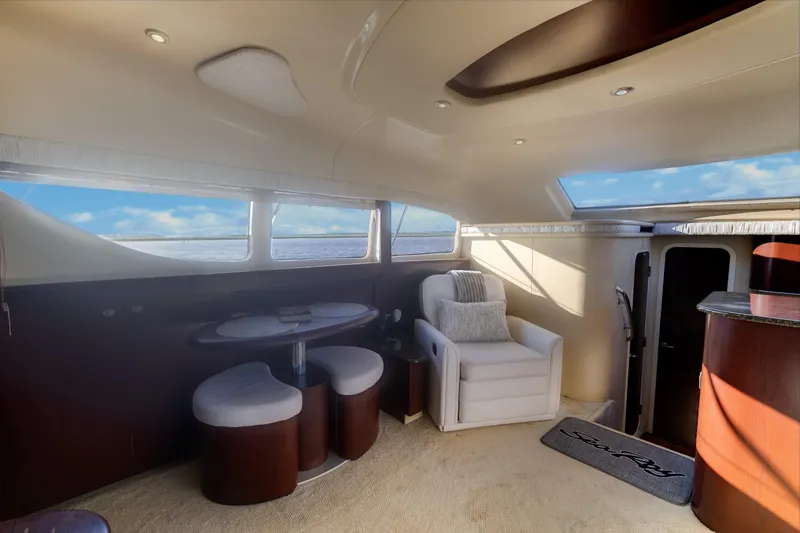 Slide: The Image of Luxurious interior of 2007 Sea Ray 40 Motor Yacht with seating and ocean view. - 33