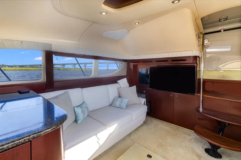 Slide: The Image of Luxurious interior of 2007 Sea Ray 40 Motor Yacht with sofa and TV. - 35
