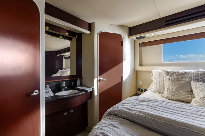Slide: The Image of Luxurious 2007 Sea Ray 40 Motor Yacht bedroom with ensuite bathroom and ocean view. - 44