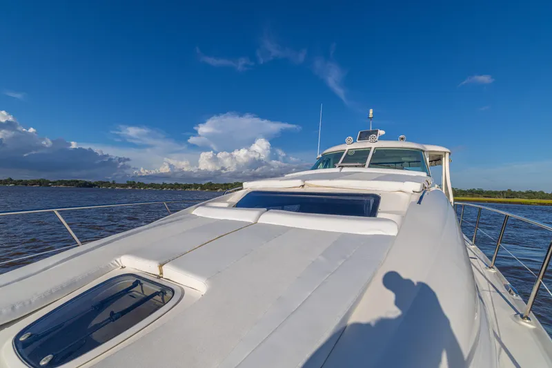 Slide: The Image of 2007 Sea Ray 40 Motor Yacht cruising on a sunny day with clear blue skies. - 49