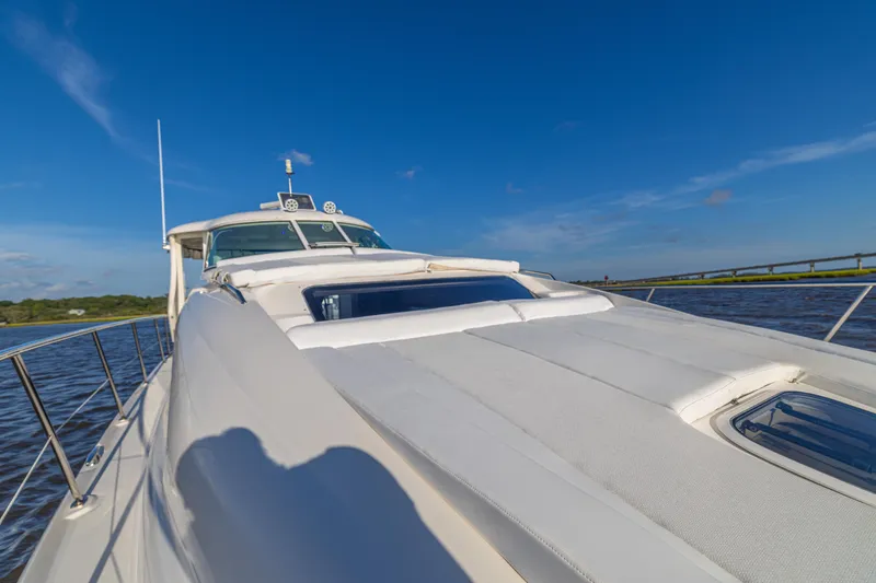 Slide: The Image of 2007 Sea Ray 40 Motor Yacht cruising on a sunny day, blue sky background. - 50