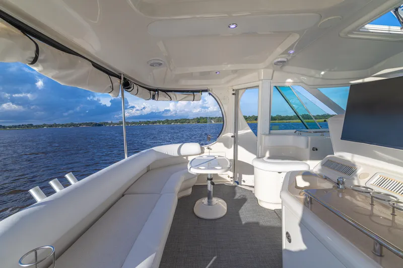 Slide: The Image of Luxurious interior of 2007 Sea Ray 40 Motor Yacht with scenic water view. - 57