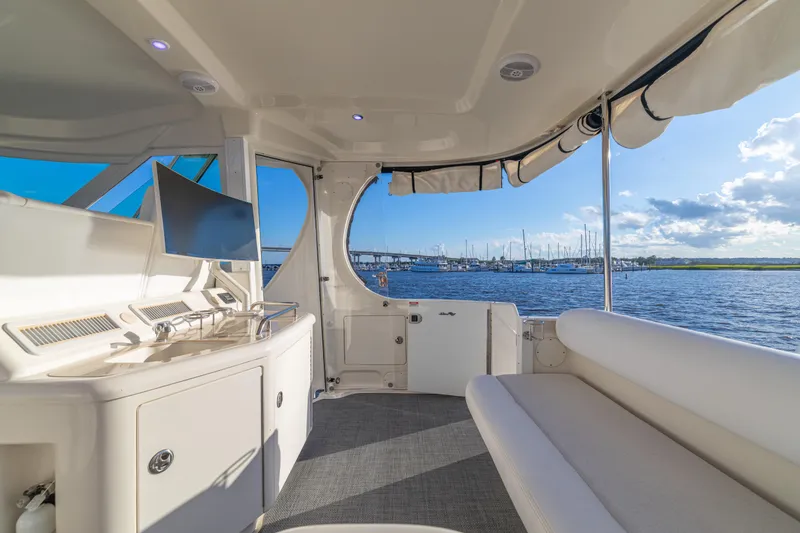 Slide: The Image of Luxurious interior of 2007 Sea Ray 40 Motor Yacht with marina view. - 62