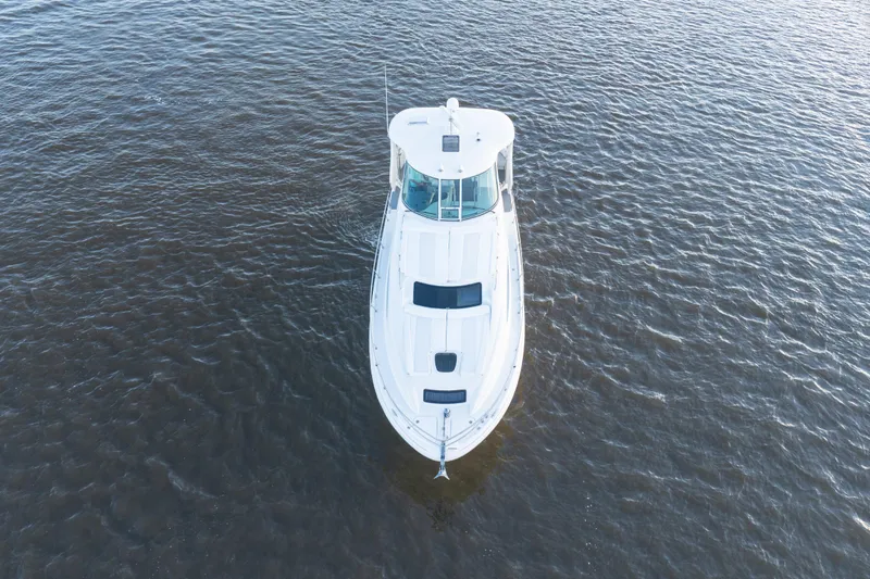 Slide: The Image of Aerial view of 2007 Sea Ray 40 Motor Yacht on open water. - 9