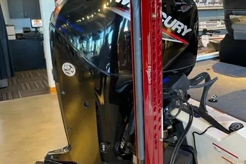 Slide: The Image of 2022 Tracker Pro Team 175 TXW boat with Mercury engine in showroom. - 14