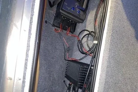 Slide: The Image of 2022 Tracker Pro Team 175 TXW boat interior wiring and battery compartment. - 16