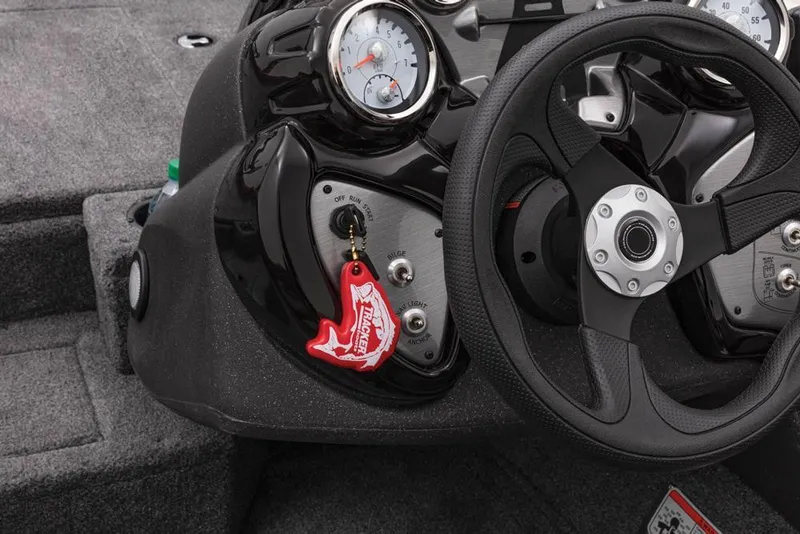Slide: The Image of 2022 Tracker Pro Team 175 TXW dashboard with steering wheel and gauges. - 28