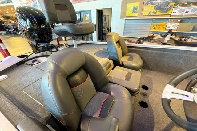 Slide: The Image of 2022 Tracker Pro Team 175 TXW boat interior with comfortable seating and modern design. - 3