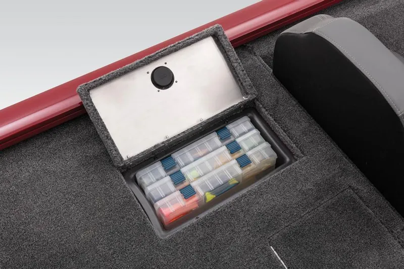 Slide: The Image of 2022 Tracker Pro Team 175 TXW storage compartment with organized tackle boxes. - 34