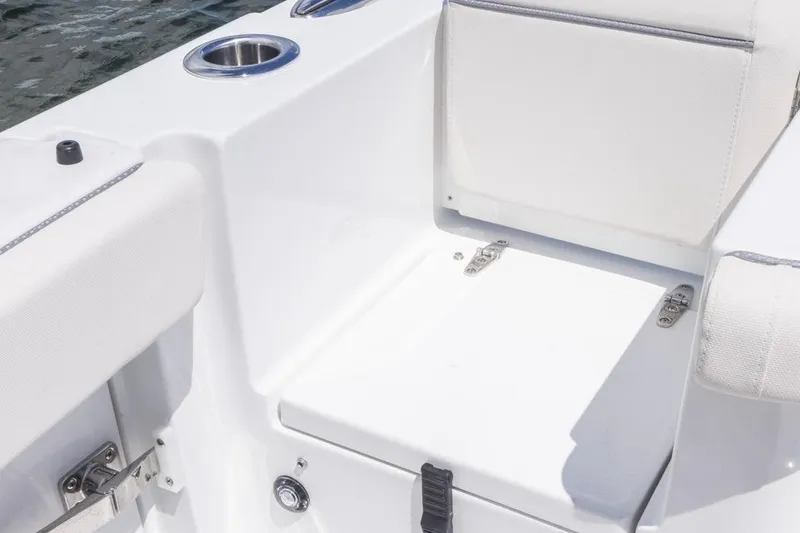 Slide: The Image of 2026 Sea Hunt Gamefish 27 Coffin Box boat seating area with cup holder. - 23