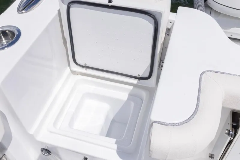 Slide: The Image of 2026 Sea Hunt Gamefish 27 Coffin Box interior with open storage compartment. - 24