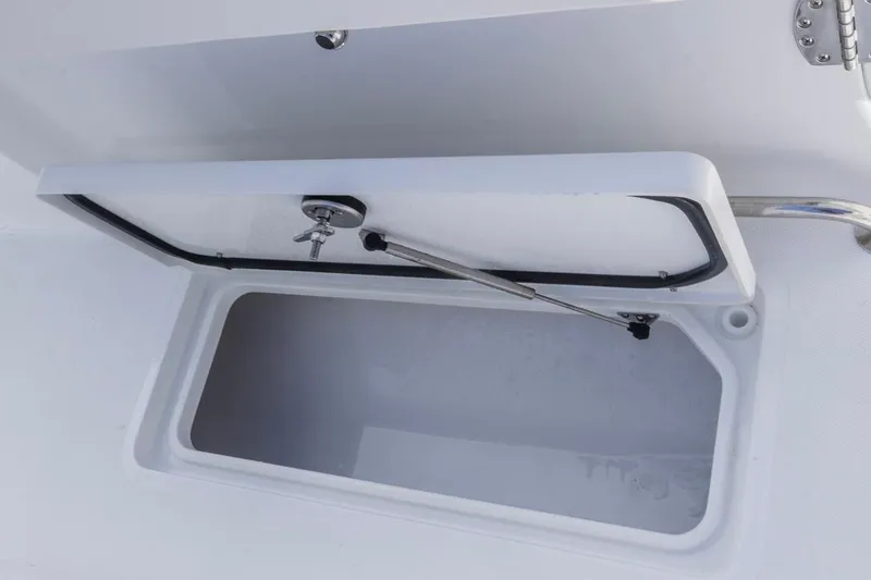 Slide: The Image of Open storage compartment on 2026 Sea Hunt Gamefish 27 Coffin Box boat. - 29