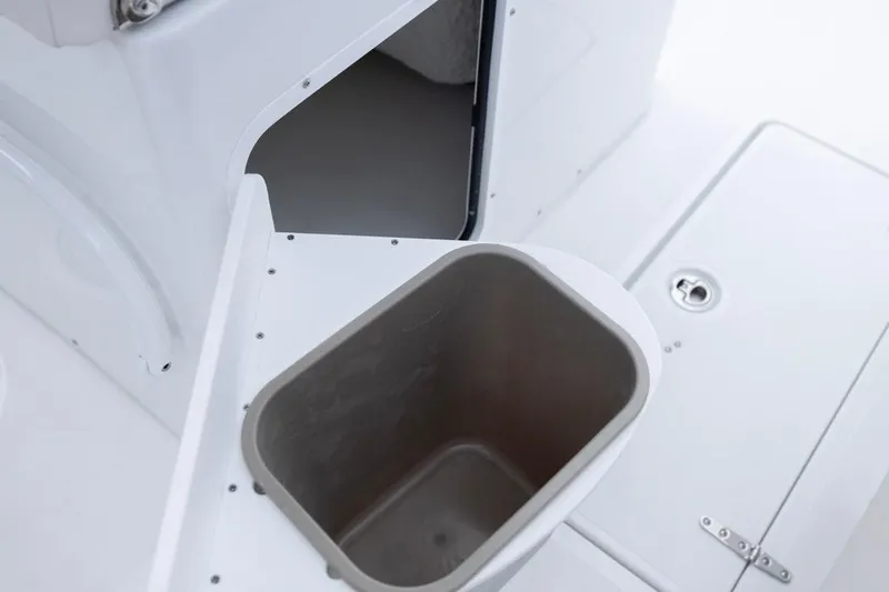 Slide: The Image of 2026 Sea Hunt Gamefish 27 Coffin Box interior, featuring storage compartment and sleek design. - 34