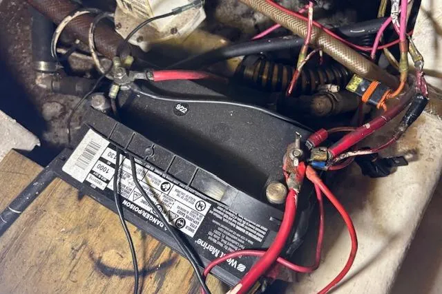 Slide: The Image of Battery and wiring setup in a 1979 Custom Sun Harbor Sundeck Trawler. - 24