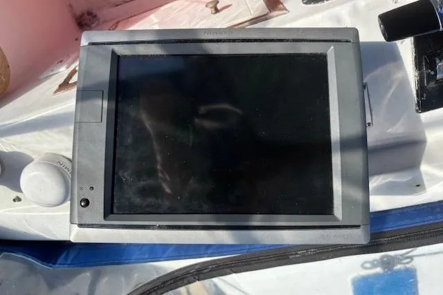 Slide: The Image of Nautical navigation device on 1979 Custom Sun Harbor Sundeck Trawler. - 8