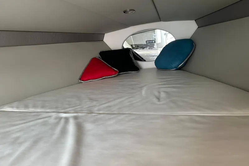 Slide: The Image of Interior cabin of 2008 Formula 292 FASTech boat with colorful cushions. - 16