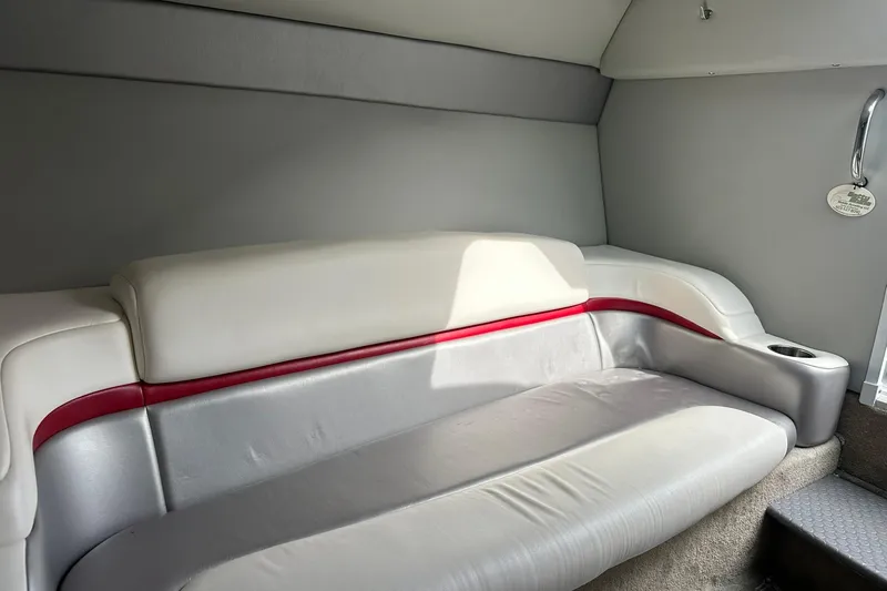 Slide: The Image of 2008 Formula 292 FASTech interior with gray and red cushioned seating. - 18