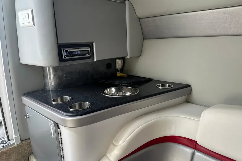 Slide: The Image of 2008 Formula 292 FASTech interior with cup holders and stereo system. - 19