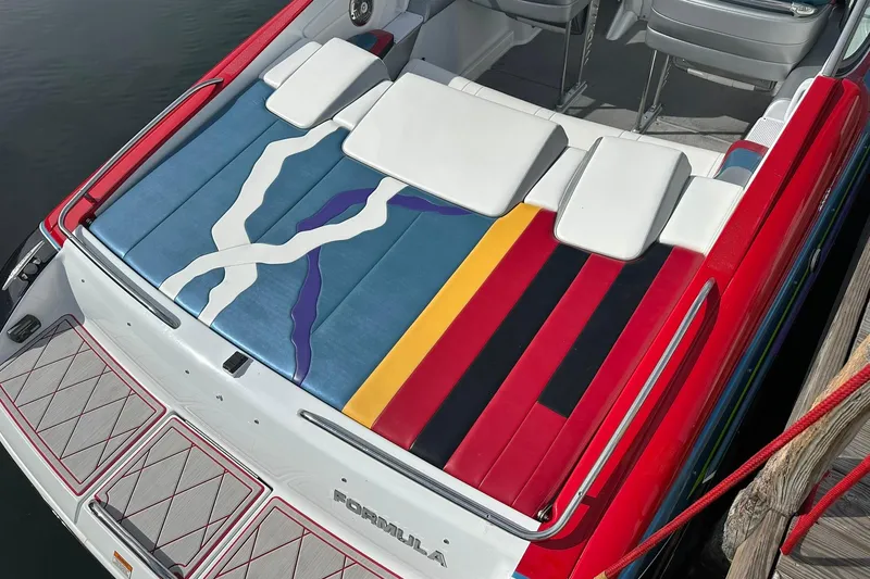 Slide: The Image of 2008 Formula 292 FASTech boat with colorful seating and sleek design. - 5