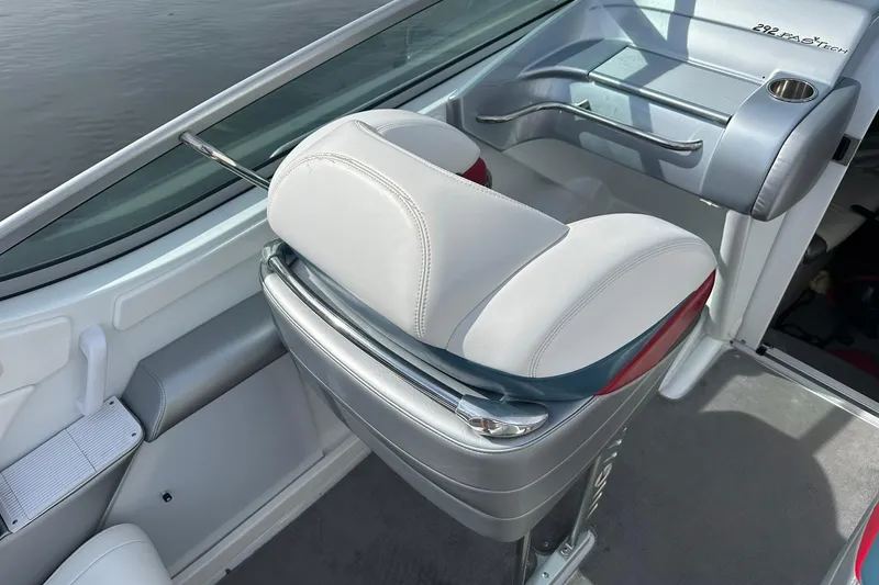 Slide: The Image of 2008 Formula 292 FASTech boat interior with white and gray seating. - 7