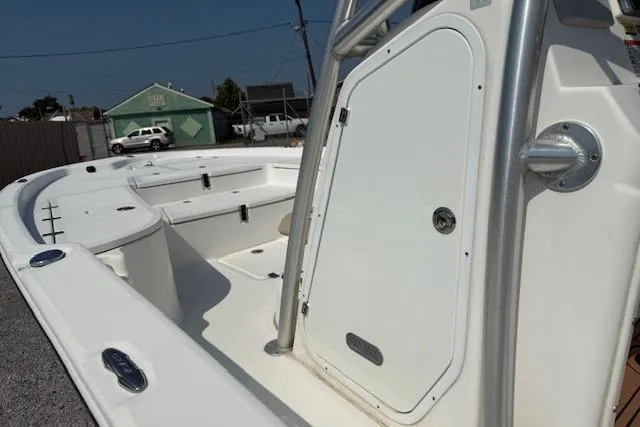 Slide: The Image of 2016 Sea Fox 240 Viper boat interior with storage compartments and seating. - 10