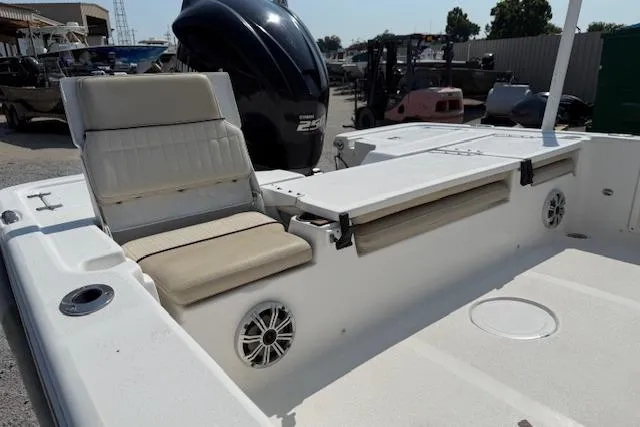 Slide: The Image of 2016 Sea Fox 240 Viper boat interior with seating and storage compartments. - 11