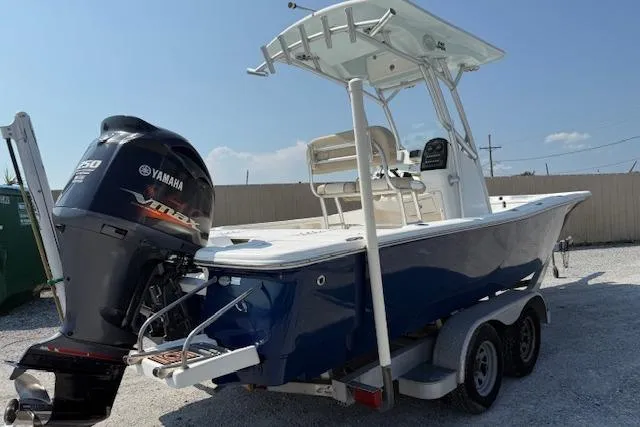Slide: The Image of 2016 Sea Fox 240 Viper boat with Yamaha engine on trailer, parked outdoors. - 4