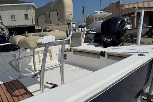 Slide: The Image of 2016 Sea Fox 240 Viper boat interior with seating and Yamaha 250 engine. - 5