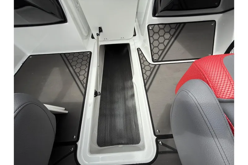 Slide: The Image of 2026 Scarab 195 LX interior with open storage compartment and stylish seating. - 20