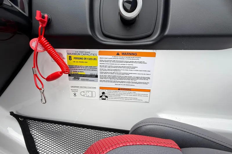 Slide: The Image of Dashboard of 2026 Scarab 195 LX with safety warnings and capacity details. - 27