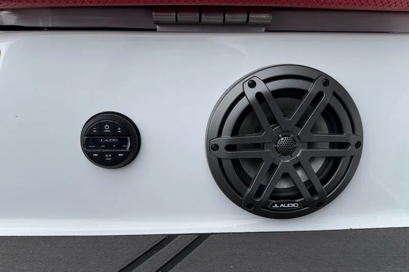 Slide: The Image of JL Audio speaker and control panel on 2026 Scarab 195 LX boat. - 28