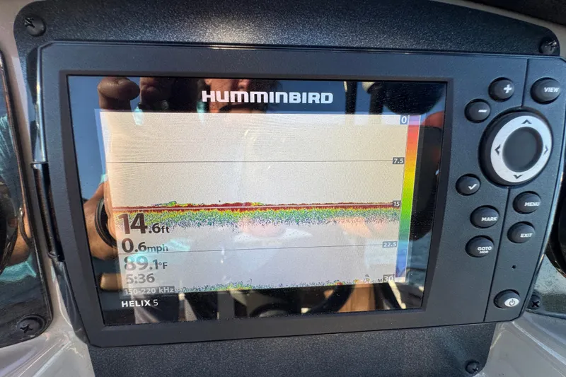 Slide: The Image of Humminbird Helix 5 fish finder display on 2021 Stingray 192 SC boat dashboard. - 20
