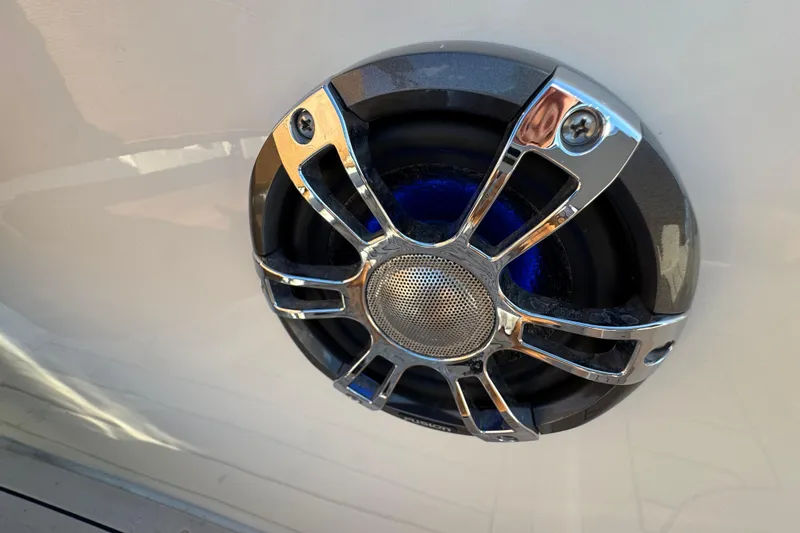 Slide: The Image of Close-up of a speaker on a 2021 Stingray 192 SC boat. - 26